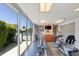 Bright gym with fitness equipment and views of the pool and lush landscaping at 1000 Riverside Dr # B501, Palmetto, FL 34221