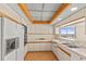 Well-lit kitchen featuring an oven, refrigerator, and sleek countertops at 1000 Riverside Dr # B501, Palmetto, FL 34221
