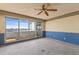 Large living room with sliding glass doors to balcony and a view of water at 1000 Riverside Dr # B501, Palmetto, FL 34221