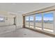Bright living room with sliding glass doors to a balcony, offering beautiful water views at 1000 Riverside Dr # B501, Palmetto, FL 34221