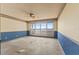 Spacious living room with floor-to-ceiling windows offering views of the water at 1000 Riverside Dr # B501, Palmetto, FL 34221