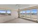 Bright living room with waterfront views and access to balcony at 1000 Riverside Dr # B501, Palmetto, FL 34221