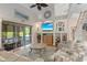 Inviting living room area with sliding glass door to patio, and staircase to the second floor at 1016 91St Nw St, Bradenton, FL 34209
