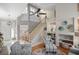 Spacious living area showcases staircase, decor and comfortable seating arrangement at 1016 91St Nw St, Bradenton, FL 34209