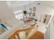 Bright living room with hardwood floors, shuttered windows and staircase to upper level at 1016 91St Nw St, Bradenton, FL 34209