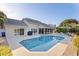 Relaxing pool area featuring ample patio space, perfect for lounging and enjoying the outdoors at 1016 91St Nw St, Bradenton, FL 34209
