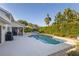 Inviting pool surrounded by lush landscaping creating a private outdoor oasis perfect for relaxation and entertainment at 1016 91St Nw St, Bradenton, FL 34209