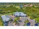 Stunning aerial view of the Waterleaf community clubhouse, golf course, and surrounding homes in Parrish, Florida at 10411 Winding Stream Way, Bradenton, FL 34212