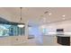 Spacious kitchen with granite countertops, stainless steel appliances, and ample cabinet space at 10411 Winding Stream Way, Bradenton, FL 34212