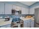 Updated kitchen featuring modern appliances, stylish cabinetry, and plenty of counter space at 108 Stanford Rd, Venice, FL 34293