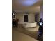 A modern living room featuring tile flooring, a unique white couch, and a ceiling fan at 1118 Wynnmere Walk Ave, Ruskin, FL 33570