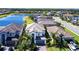 Aerial view of a neighborhood featuring lush landscaping, serene lakes, and beautiful homes at 11510 Sweetgrass Dr, Bradenton, FL 34212