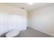 Bedroom showcasing neutral walls, carpet, and closet space at 11510 Sweetgrass Dr, Bradenton, FL 34212