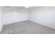 Spacious bedroom with neutral walls, carpet, and a double-door closet at 11510 Sweetgrass Dr, Bradenton, FL 34212
