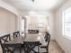 Bright dining room with stylish chandelier and dining table at 11510 Sweetgrass Dr, Bradenton, FL 34212