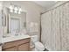 Comfortable bathroom with a shower and vanity with great lighting at 11702 Anhinga Avenue, Venice, FL 34292