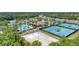 Active community featuring tennis courts, a sand volleyball court, pool and clubhouse surrounded by manicured grounds at 11702 Anhinga Avenue, Venice, FL 34292