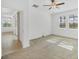 Spacious bedroom with ceiling fan and lots of natural light flowing in from adjacent spaces at 14265 17Th E Ct, Parrish, FL 34219