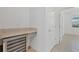 Butler's pantry with a built-in wine refrigerator and countertop space at 14265 17Th E Ct, Parrish, FL 34219