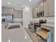 Well-equipped kitchen featuring a suite of stainless steel appliances and pull out shelving for ease of use at 14265 17Th E Ct, Parrish, FL 34219