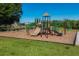 Community playground with slides, climbing structures, and a soft landing surface for enjoyment at 14265 17Th E Ct, Parrish, FL 34219