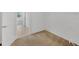 Spacious walk-in closet with carpet and shelving in a new home, offering ample storage at 14265 17Th E Ct, Parrish, FL 34219