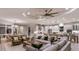 Expansive living area with modern furnishings, a gourmet kitchen, and integrated dining space at 14907 Contenta Loop, Bradenton, FL 34211