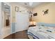 Comfortable bedroom with wall art and a closet for storage at 1520 Dorgali Dr, Sarasota, FL 34238