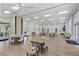 Large clubhouse with seating, tables, and natural light at 1520 Dorgali Dr, Sarasota, FL 34238