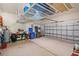 Spacious garage with an overhead storage rack at 1520 Dorgali Dr, Sarasota, FL 34238