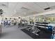 View of a modern fitness center with state-of-the-art exercise equipment and plenty of natural light at 1520 Dorgali Dr, Sarasota, FL 34238