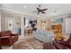 Open-concept living space with a view into the kitchen and a comfortable seating area at 1520 Dorgali Dr, Sarasota, FL 34238