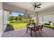 Screened patio featuring brick flooring and outdoor seating with a view of the landscape at 1520 Dorgali Dr, Sarasota, FL 34238