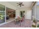 Comfortable patio with brick flooring and outdoor dining table at 1520 Dorgali Dr, Sarasota, FL 34238