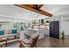 Beautiful living area with a modern kitchen island, stylish furnishings, and seamless access to the outdoor pool area at 1724 Cheyenne St, Sarasota, FL 34231