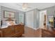 Bedroom featuring hardwood floors, closet and open entryway at 1788 Palm View Rd, Sarasota, FL 34240