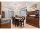 Formal dining room showcasing an elegant chandelier and ample space for hosting dinner parties at 1788 Palm View Rd, Sarasota, FL 34240