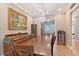 Classic dining room features a stunning chandelier and plenty of room for a large dining set at 1788 Palm View Rd, Sarasota, FL 34240