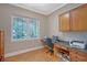 Functional office space with ample natural light and a built-in desk area, ideal for remote work at 1788 Palm View Rd, Sarasota, FL 34240
