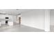 Spacious living room offers an open floor plan with access to a modern kitchen at 18016 Cherished Loop, Bradenton, FL 34211