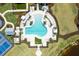 Aerial view of a luxurious community pool area with plenty of seating and lush landscaping and tennis courts at 18525 Midsummer Pl, Venice, FL 34293