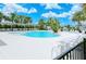 Community pool featuring comfortable lounge chairs and well-maintained pool area for residents at 1907 Woodleaf Hammock Ct, Bradenton, FL 34211