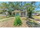 Charming single-story home with a covered porch, bay window, and mature landscaping at 209 29Th Nw St, Bradenton, FL 34205