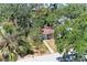Charming single-story home nestled among mature trees, providing shade and privacy at 209 29Th Nw St, Bradenton, FL 34205