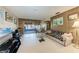 Living room with sliding glass doors that leads to outdoor living space at 209 29Th Nw St, Bradenton, FL 34205