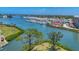 Breathtaking aerial view showcasing the marina and the expansive waterfront community at 210 Santa Maria St # 244, Venice, FL 34285
