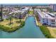 Expansive aerial view highlighting the waterfront condo community with easy access to the open water at 210 Santa Maria St # 244, Venice, FL 34285