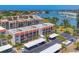 Waterfront condos with parking lot, boat docks, and lush landscaping at 210 Santa Maria St # 244, Venice, FL 34285