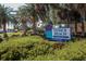 Venice Beach sign along The Esplanade with lush greenery at 210 Santa Maria St # 244, Venice, FL 34285
