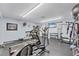 Gym featuring treadmills, weight machines, elliptical, free weights, and a flat screen television at 210 Santa Maria St # 244, Venice, FL 34285